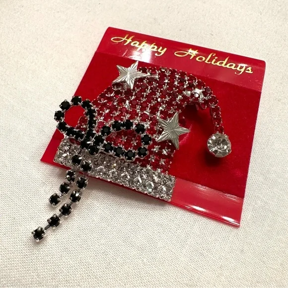 Rhinestone Santa hat brooch pin with black bow and silver-tone stars - Picture 3 of 4